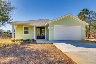 5439 Stage Coach Trail in Gulf Breeze, FL - Building Photo