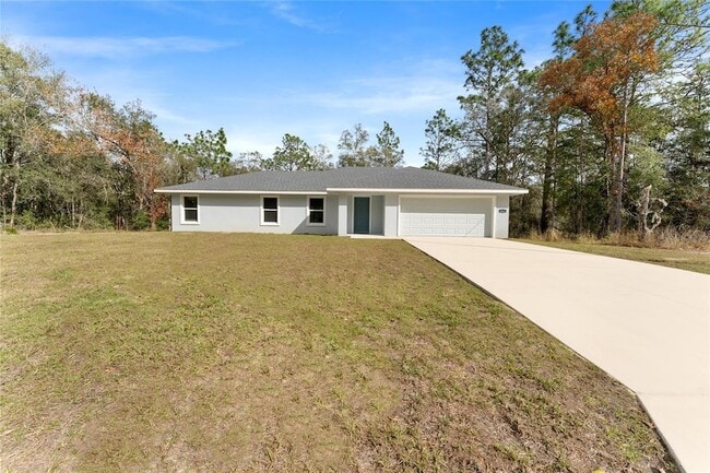 9461 N Sandree Dr in Citrus Springs, FL - Building Photo - Building Photo