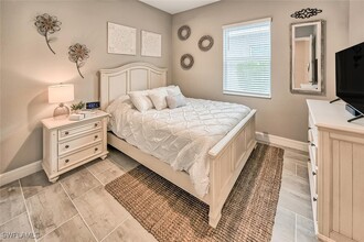 14472 Blue Bay Cir in Miromar Lakes, FL - Foto de edificio - Building Photo