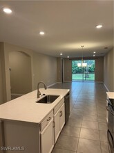 14667 Edgewater Cir in Naples, FL - Building Photo - Building Photo