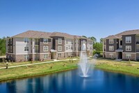 The Palms at Sunset Lakes Apartment Homes in Zachary, LA - Building Photo - Building Photo