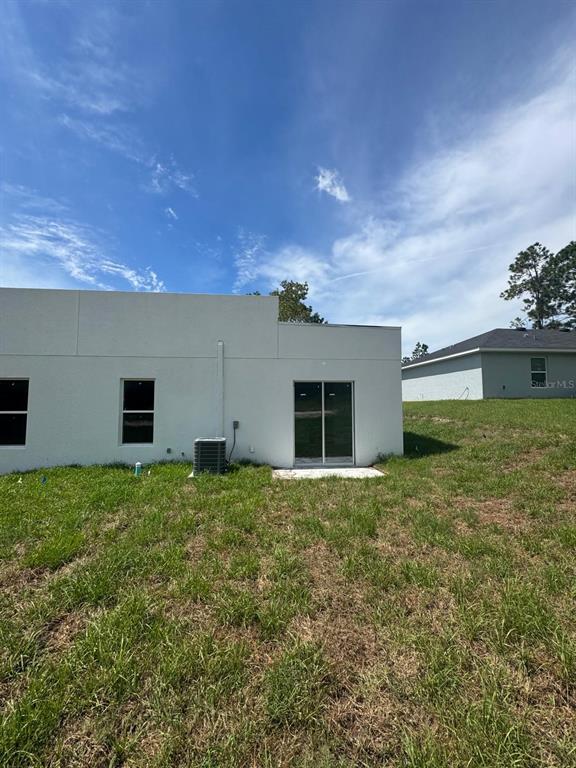 9187-9189 N Travis Dr in Citrus Springs, FL - Foto de edificio - Building Photo