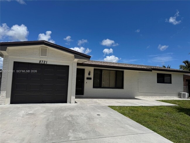 property at 8721 NW 11th St