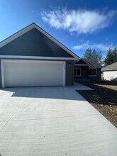 5762 Massachusetts St in Spirit Lake, ID - Building Photo - Building Photo