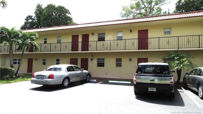 property at 1911 SW Palm City Rd