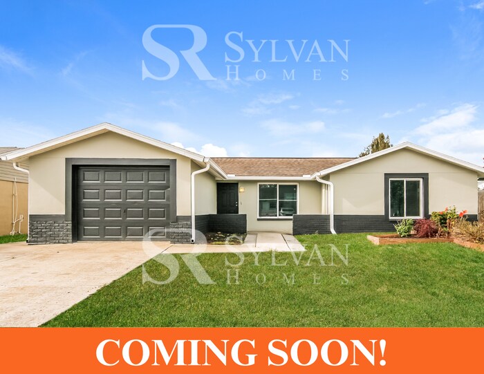 8747 St Regis Ln in Port Richey, FL - Foto de edificio