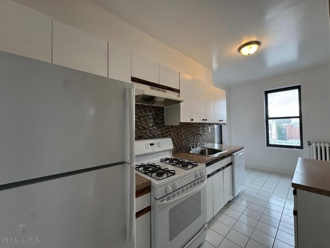 property at 36-14 165th St
