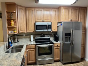 15433 Bellamar Cir, Unit 1015 in Ft. Myers, FL - Foto de edificio - Building Photo