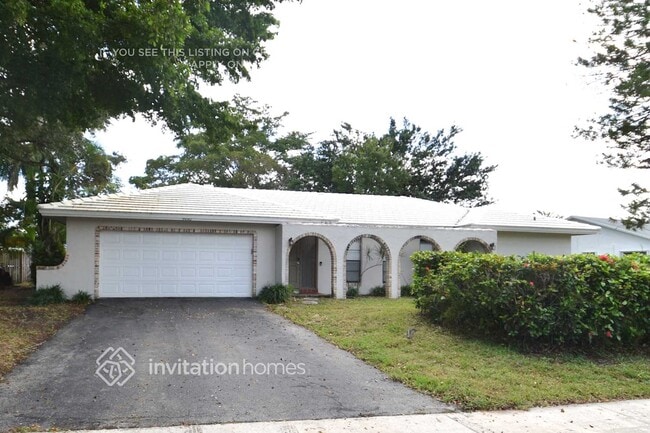 property at 9440 NW 13th St