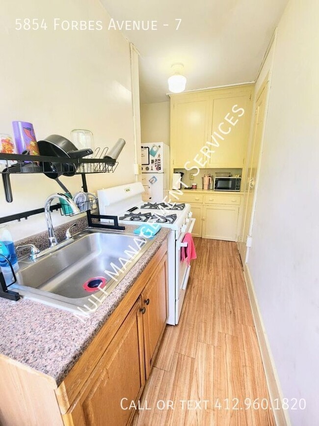 property at 5854 Forbes Ave
