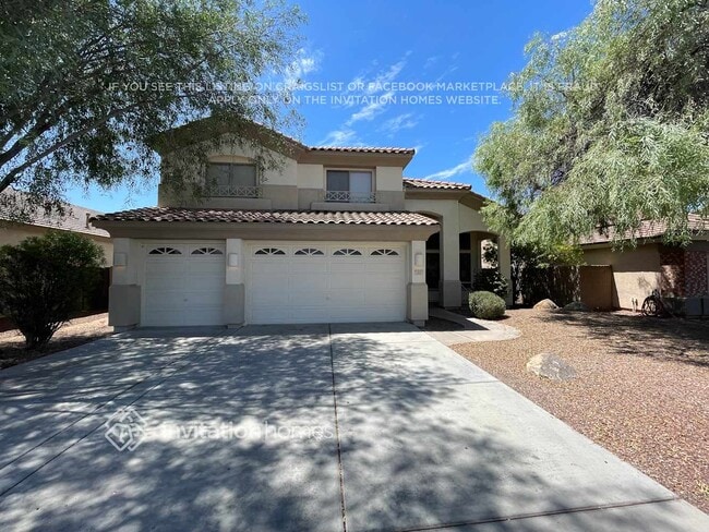 12603 W Highland Ave