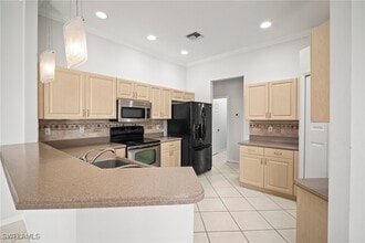 1072 Port Orange Way in Naples, FL - Building Photo - Building Photo
