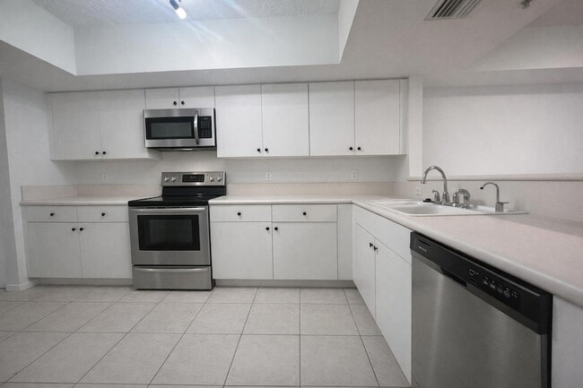 10151 W Atlantic Blvd, Unit H1 in Coral Springs, FL - Building Photo - Building Photo