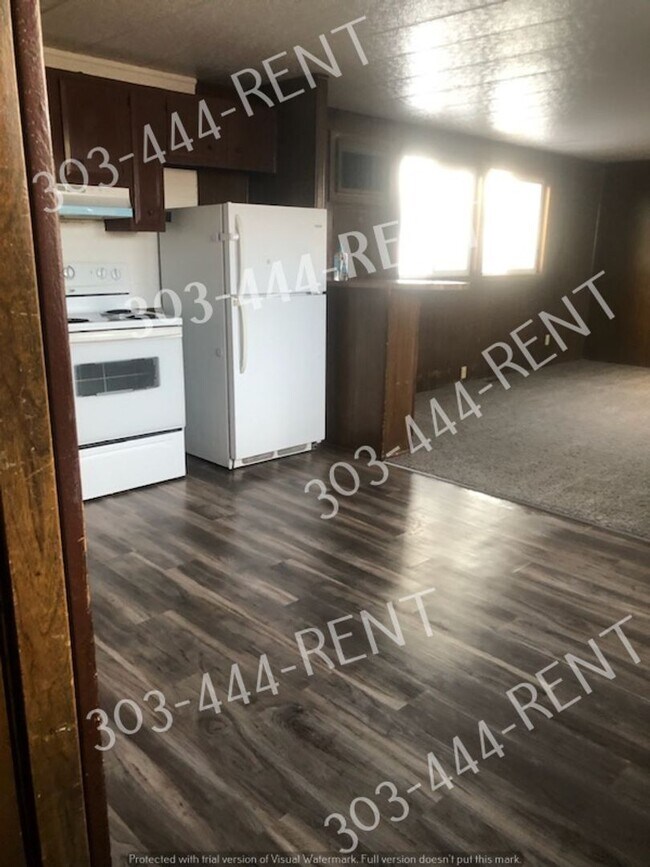 219 Balsam St in Log Lane Village, CO - Building Photo - Building Photo