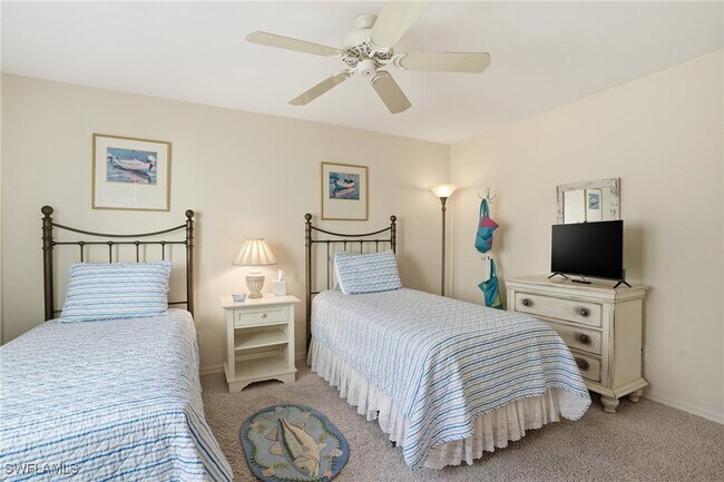 property at 7048 Pelican Bay Blvd