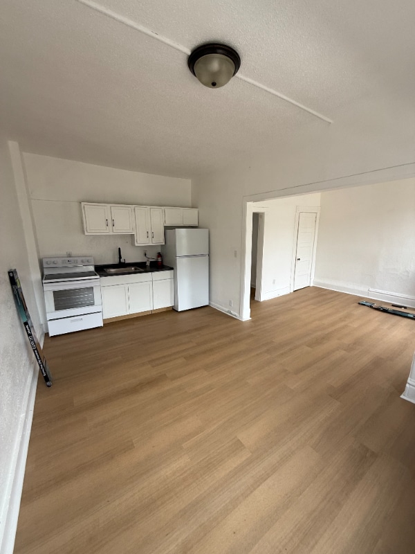 property at 118 E 3rd St