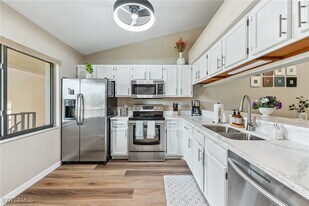 5857 Rattlesnake Hammock Rd in Naples, FL - Building Photo