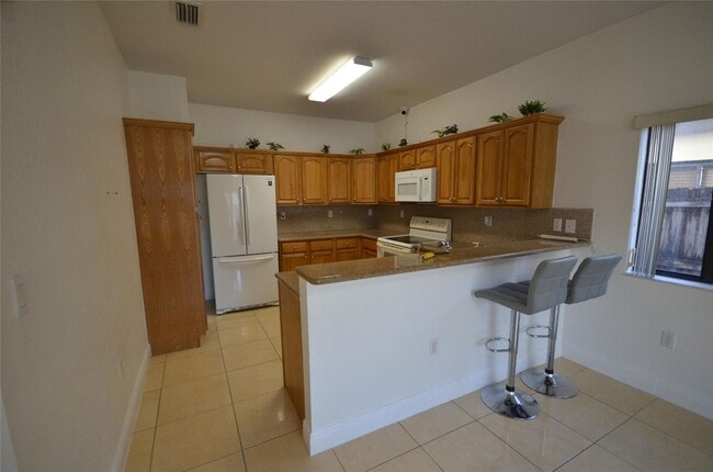 property at 14483 SW 13th Terrace