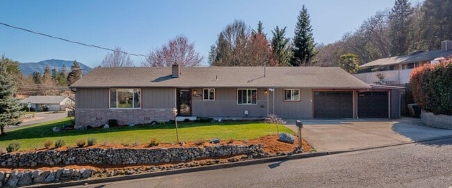 property at 903 NW Hewitt Ln