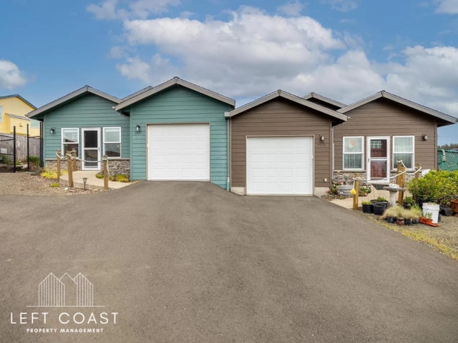 property at 5371 NE Wave Ln