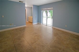 10953 W Okeechobee Rd in Hialeah Gardens, FL - Building Photo - Building Photo