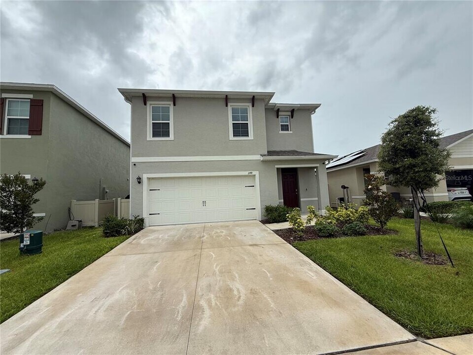 1148 Cascades Ave in Davenport, FL - Building Photo