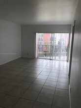 8610 N Sherman Cir, Unit 406 in Miramar, FL - Building Photo - Building Photo