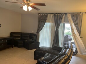 104 Arbor Lakes Dr in Davenport, FL - Foto de edificio - Building Photo