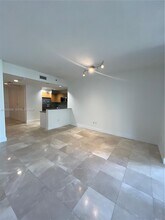 1050 Brickell Ave, Unit 1406 in Miami, FL - Building Photo - Building Photo