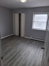 254 E Jackson St, Unit 2nd Floor Front in Joliet, IL - Foto de edificio - Building Photo