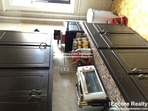 17-19 Washington St. Unit 401, Unit 401 in Malden, MA - Foto de edificio - Building Photo