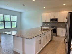 20884 Thistle Leaf Ln in Estero, FL - Building Photo - Building Photo