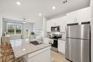 Ascend At Woodlands in Pace, FL - Building Photo