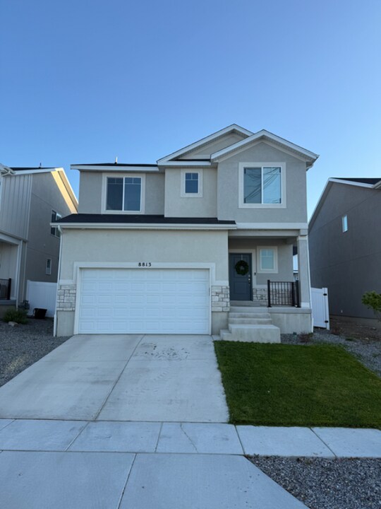 8813 W Alluvial Dr in Magna, UT - Building Photo