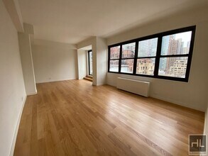 EAST 49 STREET in New York, NY - Building Photo - Building Photo