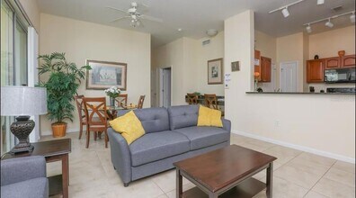 5259 Cane Island Loop, Unit 404 in Kissimmee, FL - Building Photo - Building Photo