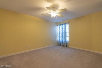 7640 Rozzini Ln in Naples, FL - Foto de edificio - Building Photo