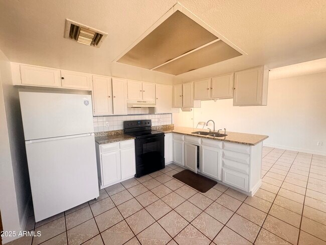 4310 N 90th Dr in Phoenix, AZ - Building Photo - Building Photo