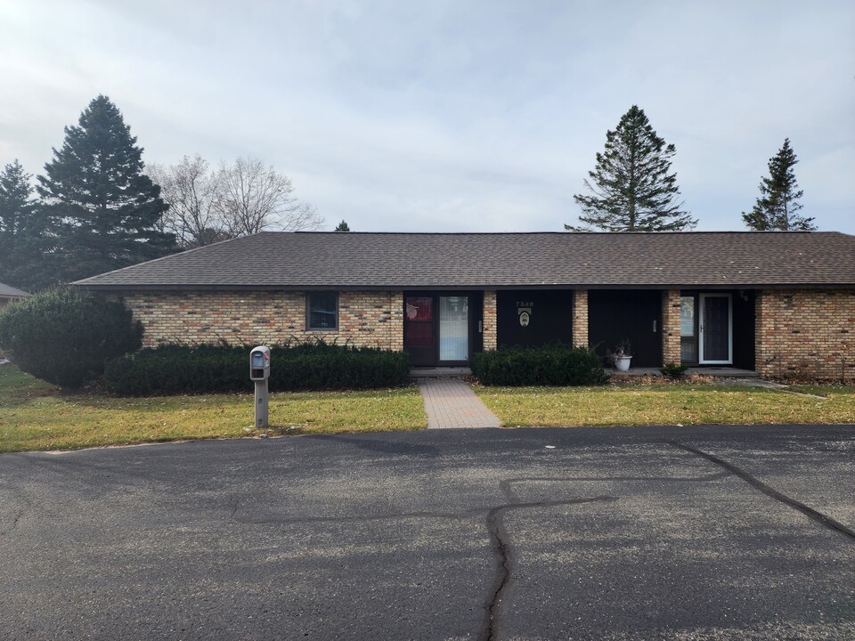 7849 Cedar Lake Rd in Oscoda, MI - Building Photo