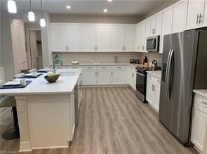 208 Indies Dr E-Unit -202 in Naples, FL - Building Photo - Building Photo