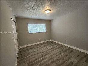 11309 SW 200th St, Unit 303-C in Miami, FL - Foto de edificio - Building Photo