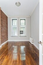 E 10TH ST., Unit 1E in New York, NY - Building Photo - Building Photo