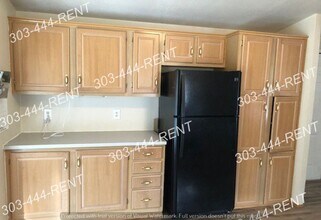 108 Beach Dr in Log Lane Village, CO - Foto de edificio - Building Photo