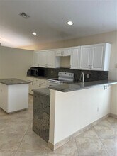 1640 Carriage Brooke Dr in Wellington, FL - Building Photo - Building Photo