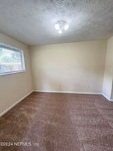 8311 Santman Ct, Unit 4109 in Jacksonville, FL - Foto de edificio - Building Photo