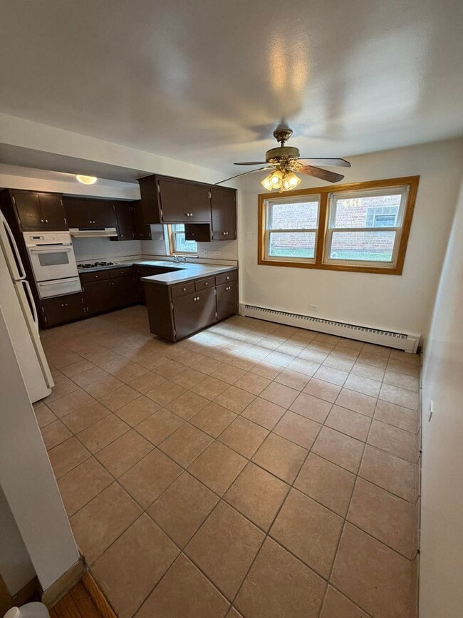 4431 N Newcastle Ave, Unit G in Harwood Heights, IL - Building Photo - Building Photo