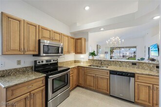 437 Wiggins Lake Ct in Naples, FL - Building Photo - Building Photo