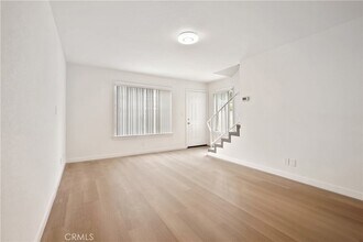 9619 Olive St, Unit AUCPAC in Bellflower, CA - Building Photo - Building Photo