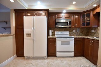 3100 W Rolling Hills Cir-Unit -407 in Davie, FL - Building Photo - Building Photo