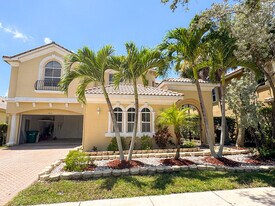 7477 NW 114th Terrace in Parkland, FL - Building Photo